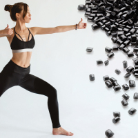 Female doing yoga and black pellets