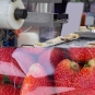 Double image of film packaging machine and strawberry packaging