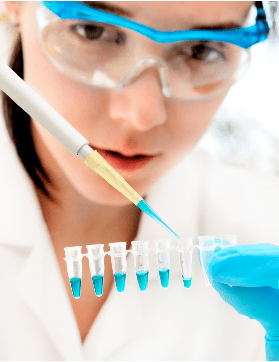 Female researcher loads DNA samples for PCR analysis