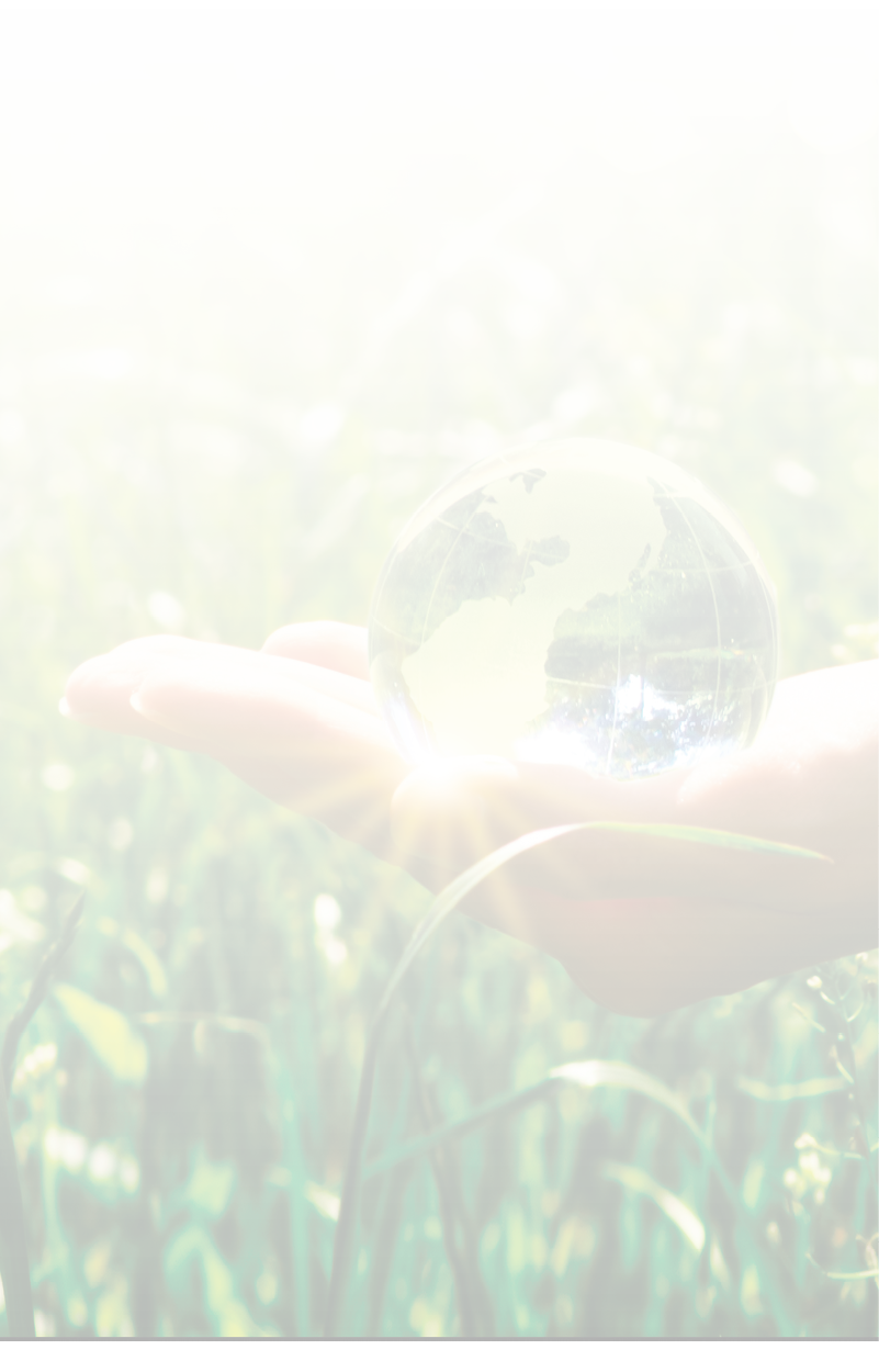 Earth crystal glass globe in human hand on grass background. Saving environment and clean green planet concept. Card for World Earth Day concept.